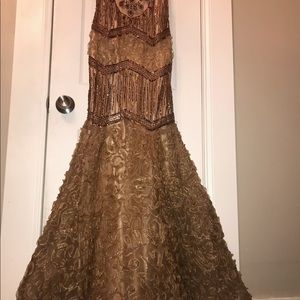 Gorgeous beaded mermaid gown.